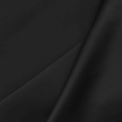 A European-made heavyweight Satin in Phantom. A beautiful fabric that has a unique silky feeling with an elegant finish. This is a double-sided fabric, with White underneath its Black exterior.