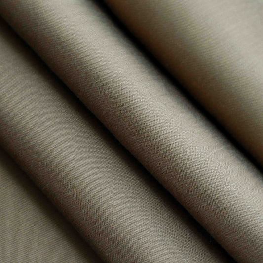 A lightweight duchess satin weave in an earthy Copper. This fabric has a dry, smooth hand feel yet softens considerably after washing. This fluid-non stretch fabric has subtle texture throughout and a matte finish.
