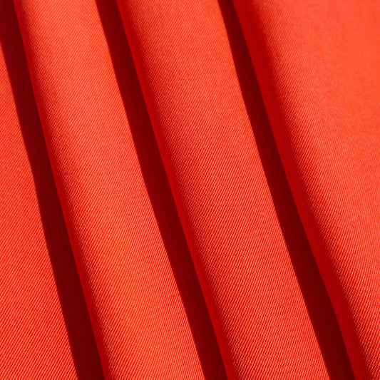 A Mid-weight twill weave in Crimson. This fabric has a dry, smooth hand feel yet softens considerably after washing. This fluid-non stretch fabric has subtle texture throughout and matte finish.