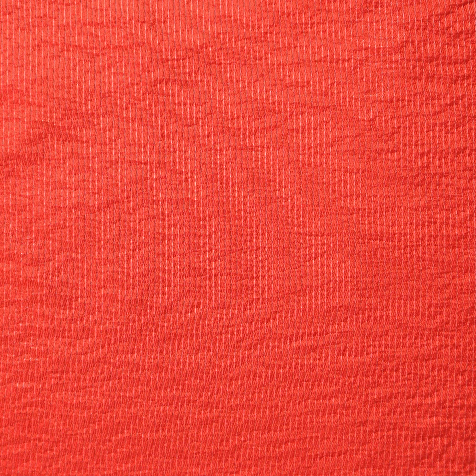 An ultra lightweight European silk crepe in paprika. This fabric has a dry, smooth hand feel yet softens considerably after washing. This fluid-non stretch fabric has subtle texture throughout and matte finish.