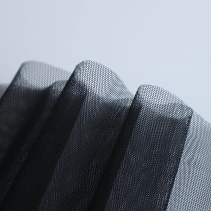 A Chinese-made super lightweight mesh in Black Ink. This fabric has good ductility and has a honeycomb mesh structure. It is soft and comfortable to the touch, has strong breathability and is not easy to warp in shape.