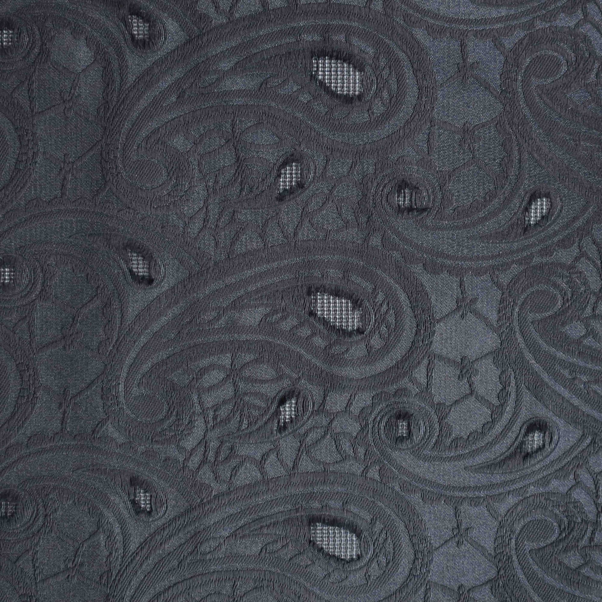 An European-made lightweight jacquard in Black Batik. Featuring black paisley prints, It has an incredible drape, a smooth, cool hand feel and with subtle stretch.