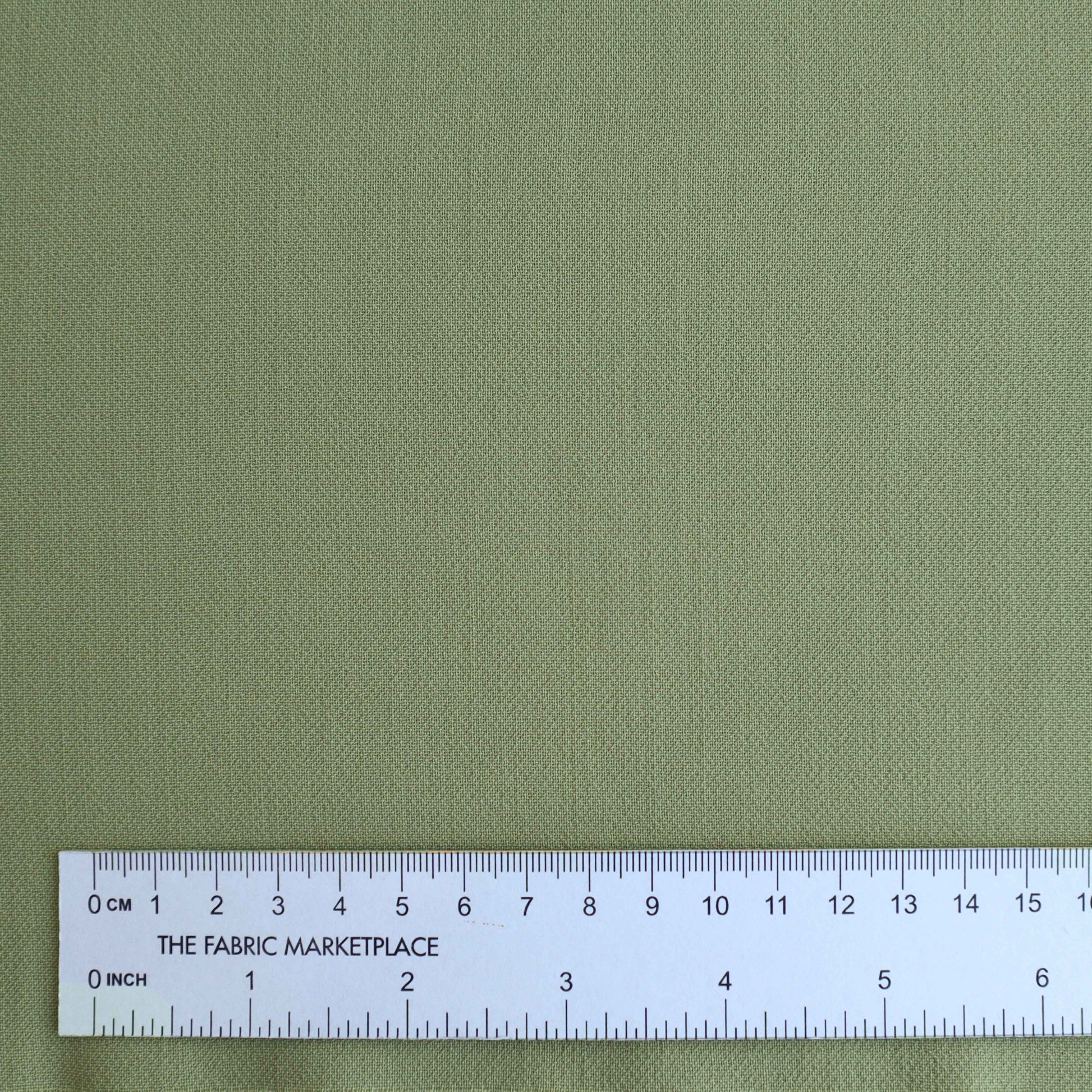 Mid-weight Viscose Spandex blend fabric in Sage. Blended with Spandex (elastane), this fabric does not limit movements when made into garments. 