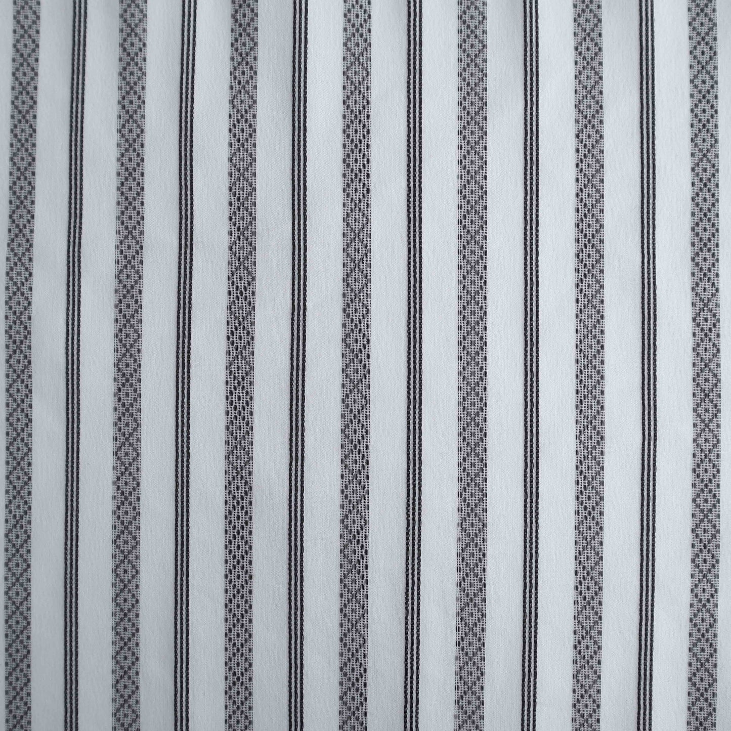 A lightweight Rayon blended fabric with Jacquard texture stripes. This fabric is stretchable in one-way, across. It is also breathable and soft.