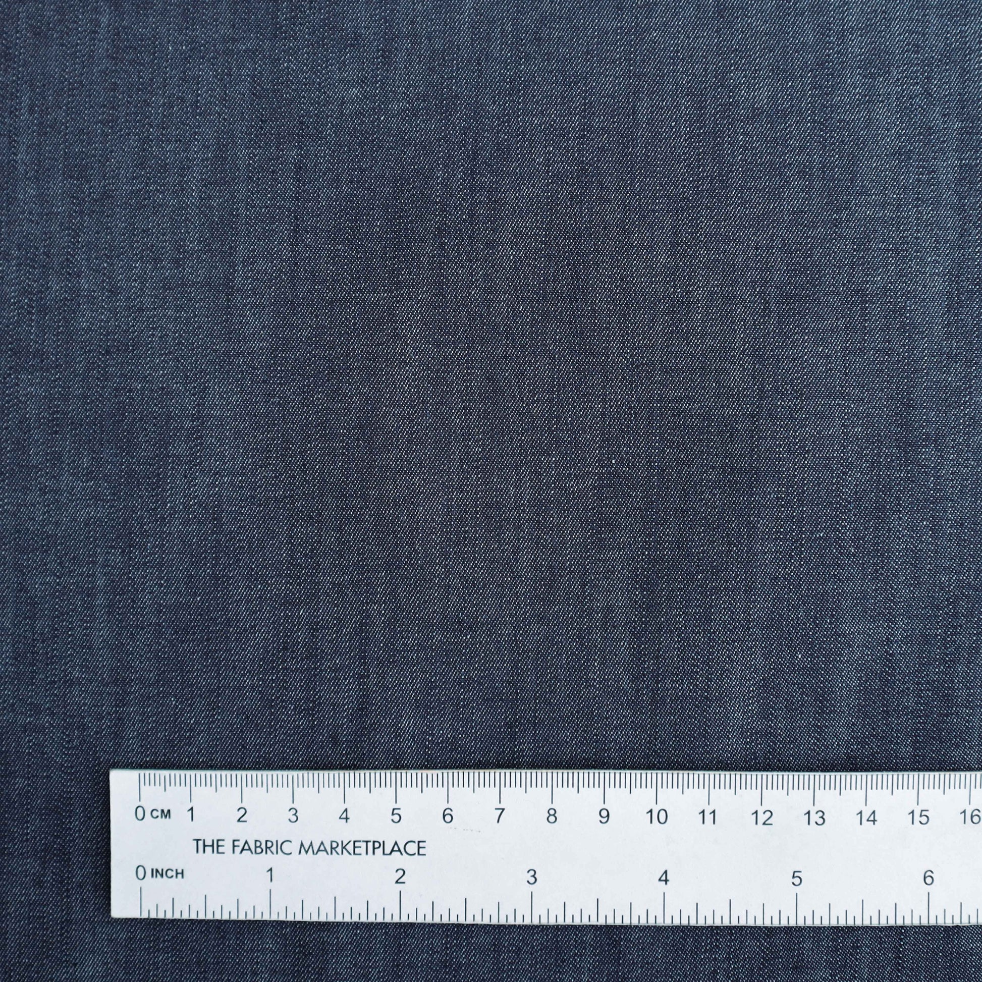 A mid-weight cotton stretch denim fabric. It does not snag or tear easily while still having a stretch to it