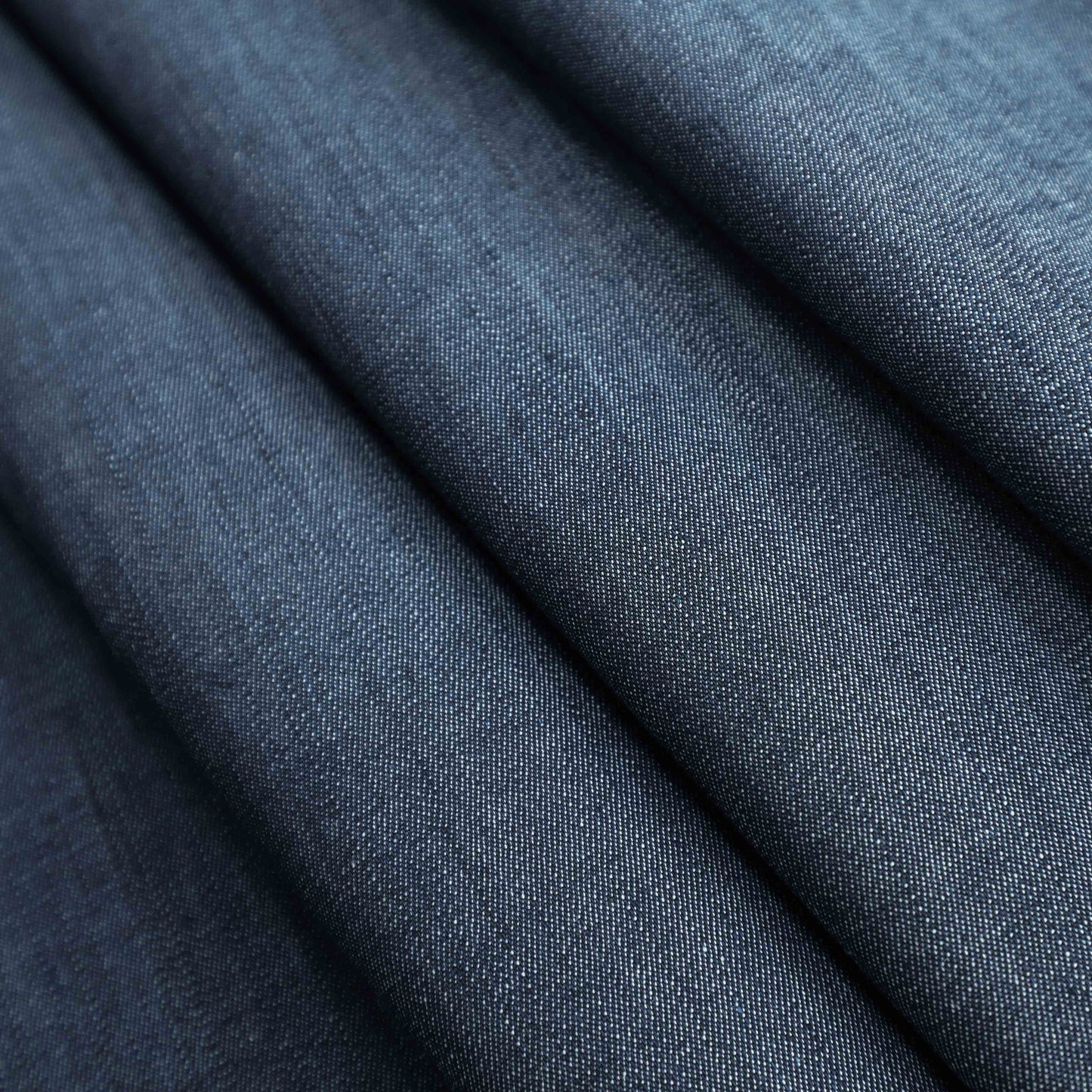 A mid-weight cotton stretch denim fabric. It does not snag or tear easily while still having a stretch to it.